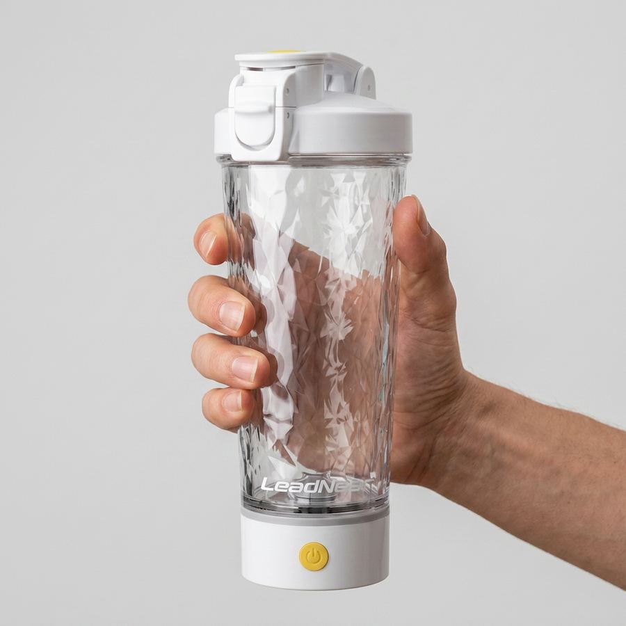 White 700ml Electric Shaker Pro held in hand lifestyle
